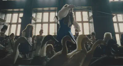 Duck race is completely normal, as conveyed by the lens choice