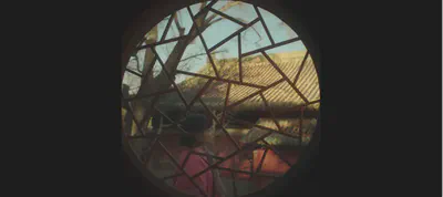 she is now “framed”, and “behind bars”